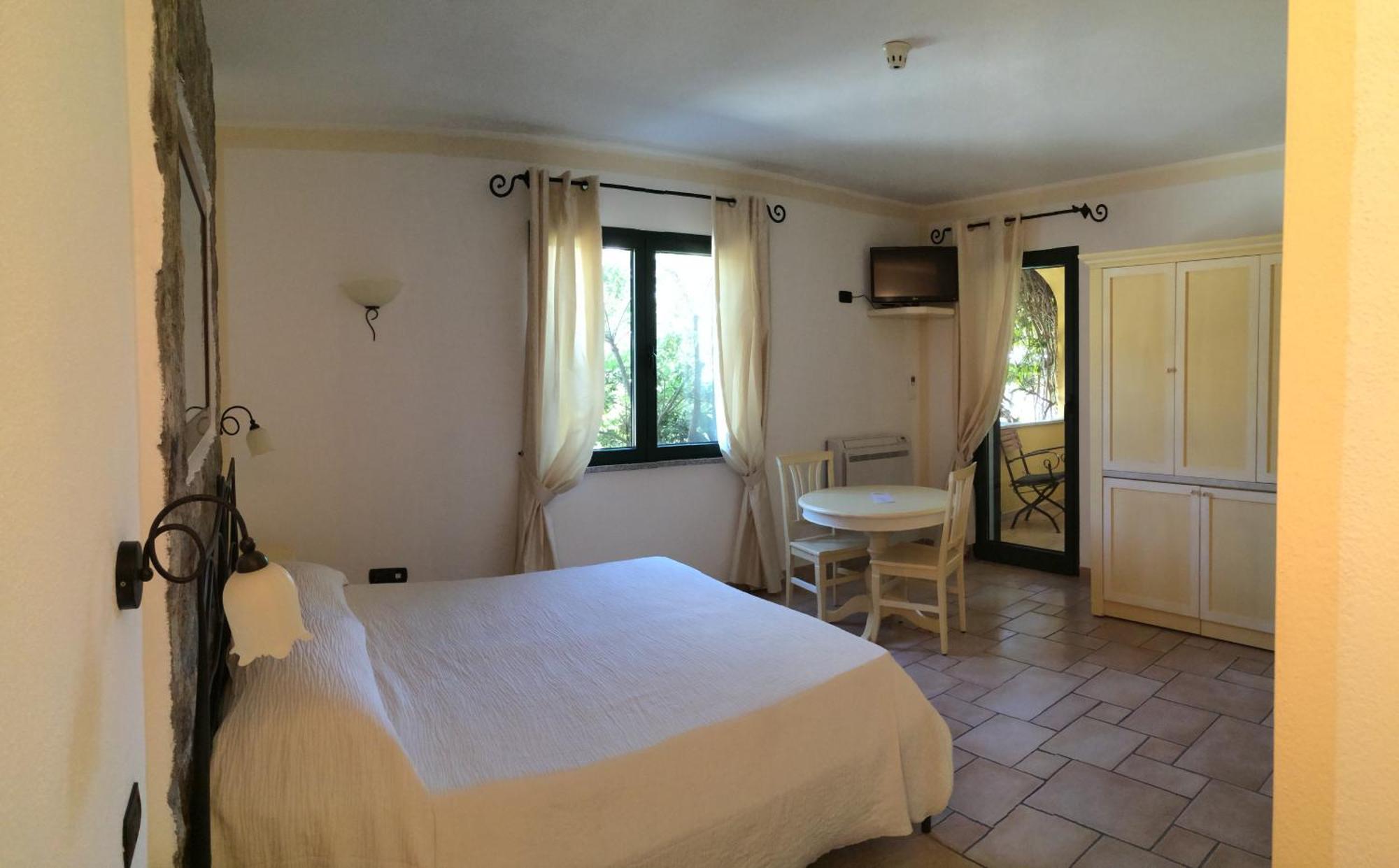 Hotel Villa Del Parco Ла-Маддалена Номер фото